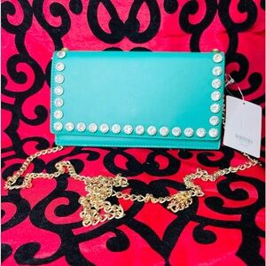 - Women’s Faux Leather Clutch Purse Green